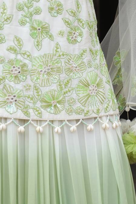 Shop_Nitisha Kashyap Official_Ivory Georgette, Net, Silk Sequins, Beads Floral Embroidered Kurta Sharara Set _Online_at_Aza_Fashions