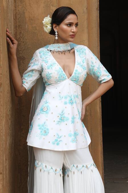 Shop_Nitisha Kashyap Official_Blue Net, Georgette, Silk Sequins, Beads Floral Embroidered Kurta Gharara Set _Online_at_Aza_Fashions