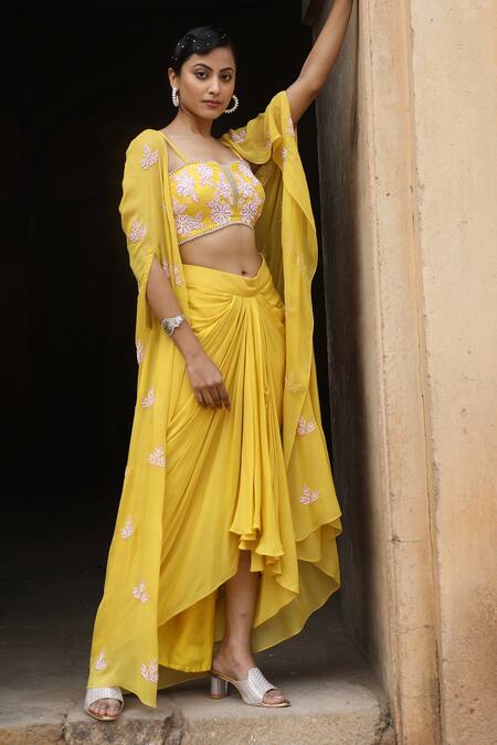 Nitisha Kashyap Official_Yellow Crepe, Georgette, Silk Sequins, Cut Work, Embroidered Cape Skirt Set _Online_at_Aza_Fashions