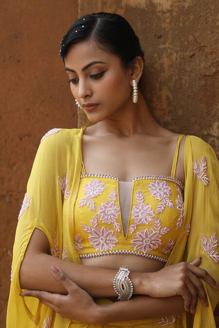 Shop_Nitisha Kashyap Official_Yellow Crepe, Georgette, Silk Sequins, Cut Work, Embroidered Cape Skirt Set _Online_at_Aza_Fashions