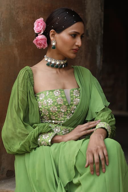 Nitisha Kashyap Official_Green Georgette, Silk Beads, Cut Work, Pre-draped Ruffle Saree Bustier Set _at_Aza_Fashions