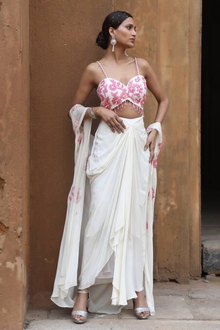 Nitisha Kashyap Official_Ivory Crepe, Georgette Sequins, Beads Sweetheart Neck Embroidered Cape Skirt Set _Online_at_Aza_Fashions