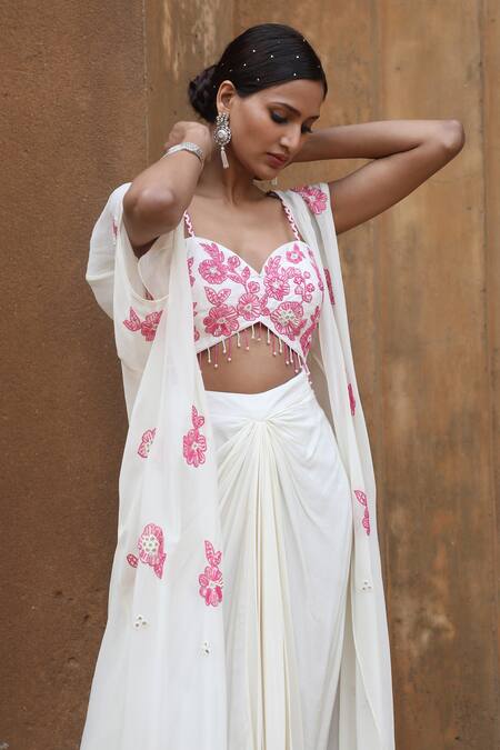 Shop_Nitisha Kashyap Official_Ivory Crepe, Georgette Sequins, Beads Sweetheart Neck Embroidered Cape Skirt Set _Online_at_Aza_Fashions