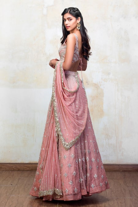 Shop Izzumi Mehta Pink Lehenga And Blouse Organza Dupatta Net Leaf Neck Embellished Bridal Set at Aza Fashions Shop_Izzumi Mehta_Pink Lehenga And Blouse Organza Dupatta Net Leaf Neck Embellished Bridal Set _at_Aza_Fashions