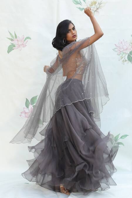 Taavare Grey Organza, Tulle Blouse Scoop Neck, Cape Open Embroidered Lehenga Set Online at Aza Fashions Taavare_Grey Organza, Tulle Blouse Scoop Neck, Cape Open Embroidered Lehenga Set_Online_at_Aza_Fashions