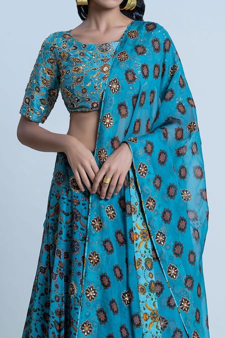 Nautanky Blue Blouse- Viscose Silk, Lehenga And Dupatta- Organza Iznik Print Bridal Set at Aza Fashions Nautanky_Blue Blouse- Viscose Silk, Lehenga And Dupatta- Organza Iznik Print Bridal Set _at_Aza_Fashions