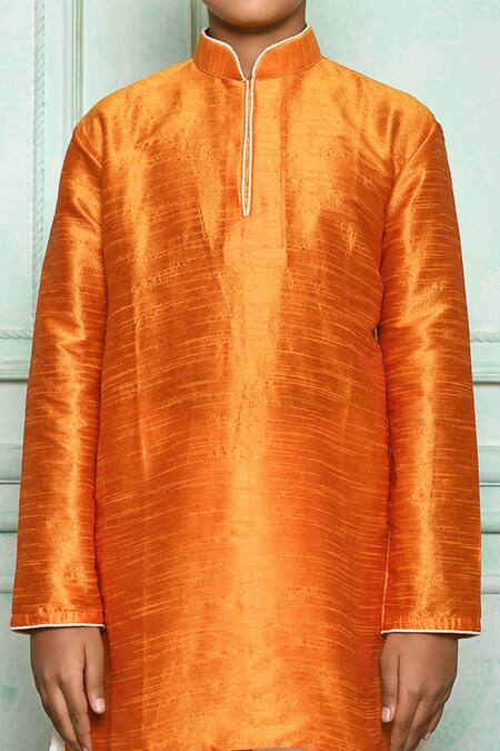 Petite Pomme Orange , Satin Solid Kurta And Cream Dhoti Pant Set at Aza Fashions Petite Pomme_Orange , Satin Solid Kurta And Cream Dhoti Pant Set _at_Aza_Fashions