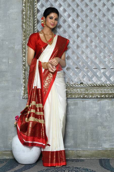 Twirling Off White Soft Banarasi Silk Saree With Panoply Blo