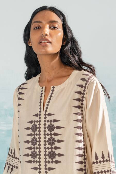 Ikai By Ragini Ahuja_Beige Cotton, Silk, Chanderi Applique Split V-neck Nile Tribal A-line Kurta_Online_at_Aza_Fashions