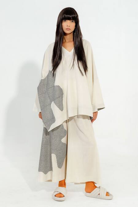 Stoique_Off White Cotton Muslin Applique Avocado Work Flared Pant _Online_at_Aza_Fashions