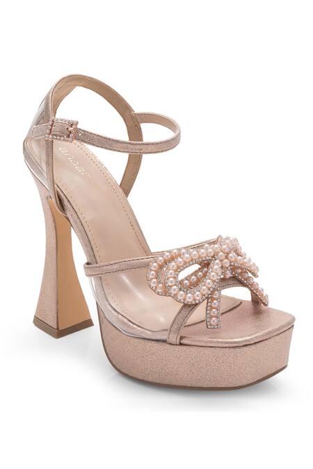 Anaar Gold Rhinestones, Bows Queen Street Pearl Embellished Heels Online at Aza Fashions Anaar_Gold Rhinestones, Bows Queen Street Pearl Embellished Heels_Online_at_Aza_Fashions