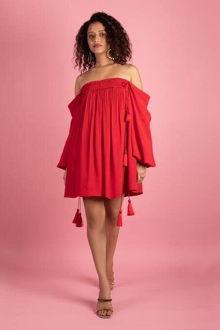 Shop Style Junkiie Red Crepe Tassels Off-shoulder Off Smocked Dress Online at Aza Fashions Shop_Style Junkiie_Red Crepe Tassels Off-shoulder Off Smocked Dress _Online_at_Aza_Fashions