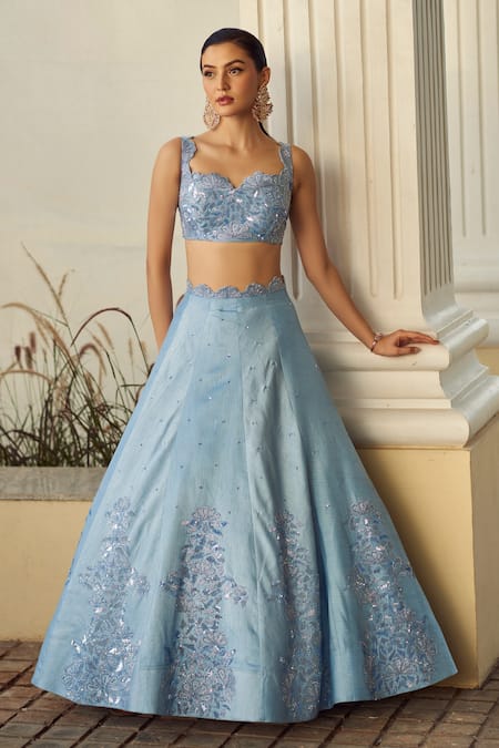 Sanjana Reddy Designs_Blue Falling Raw Silk Floral, Sequin Sweetheart Embroidered Lehenga And Blouse Set_Online_at_Aza_Fashions