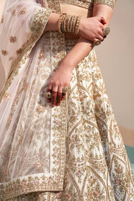 Buy Angad Singh Ivory Silk Cut Work, Sequins, Floral Embroidered Zardozi Bridal Lehenga Set Online at Aza Fashions Buy_Angad Singh_Ivory Silk Cut Work, Sequins, Floral Embroidered Zardozi Bridal Lehenga Set _Online_at_Aza_Fashions