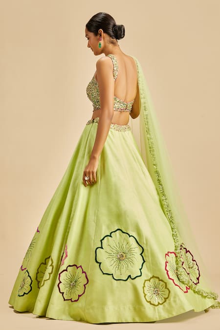 Shop Nitika Gujral Green Lehenga And Blouse Raw Silk & Dupatta Net Embroidery Floral Applique Set Online at Aza Fashions Shop_Nitika Gujral_Green Lehenga And Blouse Raw Silk & Dupatta Net Embroidery Floral Applique Set _Online_at_Aza_Fashions