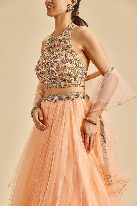 Buy_Nitika Gujral_Peach Lehenga And Dupatta Net Embroidery Floral Halter Waistband Blouse Set _Online_at_Aza_Fashions
