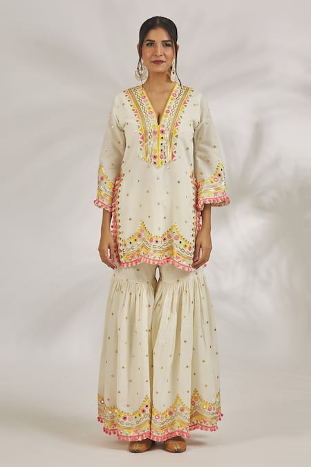 Gopi Vaid_Ivory Cotton Tassels, Bani Thread And Mirror Embroidered Kurta Sharara Set_at_Aza_Fashions
