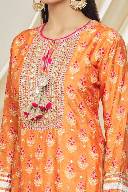 Gopi Vaid_Orange Tussar Tassels Round Neck Tilla Embellished Neckline Tunic _at_Aza_Fashions