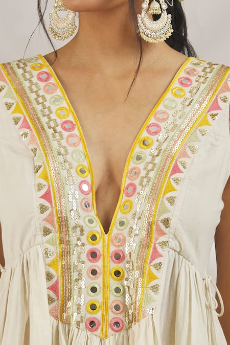 Gopi Vaid Ivory Cotton Sequins, Mirrors Plunge Hana Embroidered Peplum Kurta With Sharara Online at Aza Fashions Gopi Vaid_Ivory Cotton Sequins, Mirrors Plunge Hana Embroidered Peplum Kurta With Sharara _Online_at_Aza_Fashions