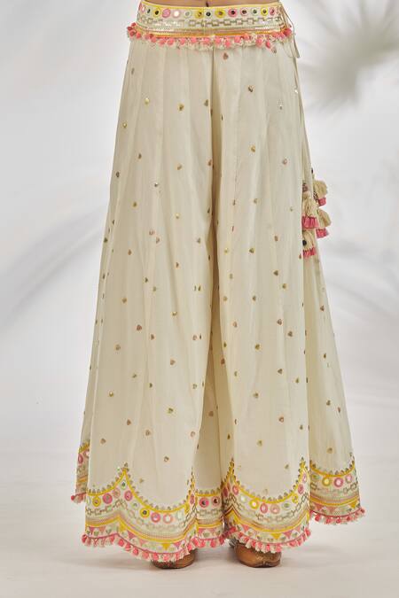 Gopi Vaid_Ivory Cotton Tassels, Amyra Embroidered One Shoulder Tunic With Sharara_at_Aza_Fashions