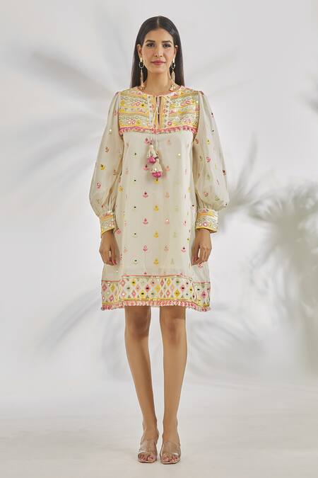 Gopi Vaid_Ivory Cotton Tassels, Pom-poms Round Shehnaz Mirror And Thread Embroidered Dress _at_Aza_Fashions