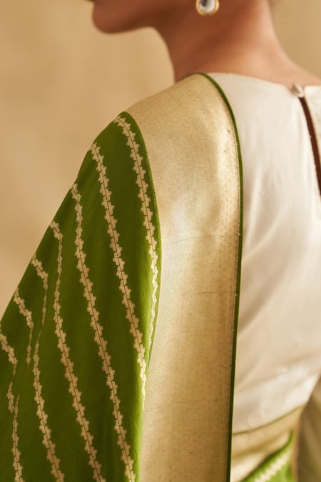 Buy Taisha Cream Satin Tassels Round Neck Pure Silk Blouse Online at Aza Fashions Buy_Taisha_Cream Satin Tassels Round Neck Pure Silk Blouse _Online_at_Aza_Fashions