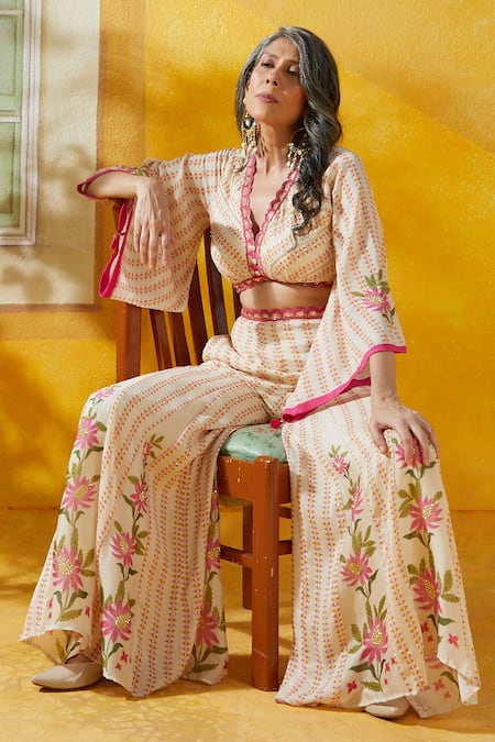 Buy Beige Chiffon Printed And Embroidered Floral Top & Bell Bottom