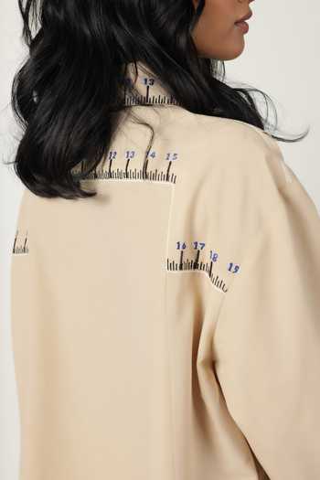 Shop_Shahin Mannan_Beige Poplin Embroidery Shawl Neck Measuring Tape Front Pleated Dress _Online_at_Aza_Fashions