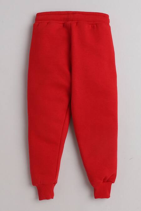 Knitting Doodles Red Fleece Printed Cloud And Aeroplane Top & Joggers Set at Aza Fashions Knitting Doodles_Red Fleece Printed Cloud And Aeroplane Top & Joggers Set_at_Aza_Fashions