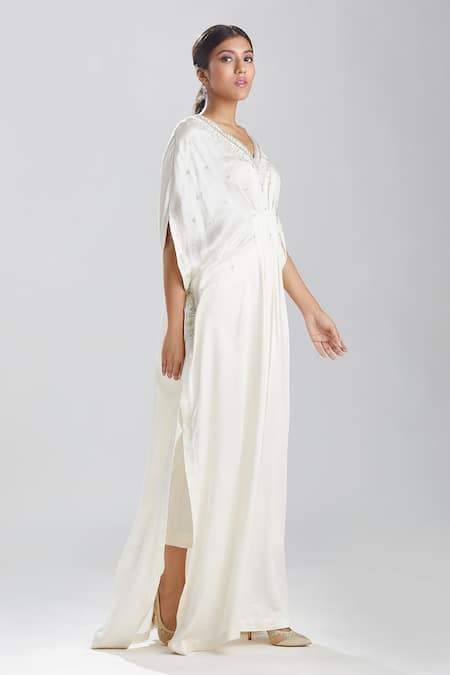 Buy Megha Bansal Ivory Satin Cut Dana, Sequin And Beads Work V Neck Motia Azmina Kaftan Gown Online at Aza Fashions Buy_Megha Bansal_Ivory Satin Cut Dana, Sequin And Beads Work V Neck Motia Azmina Kaftan Gown _Online_at_Aza_Fashions