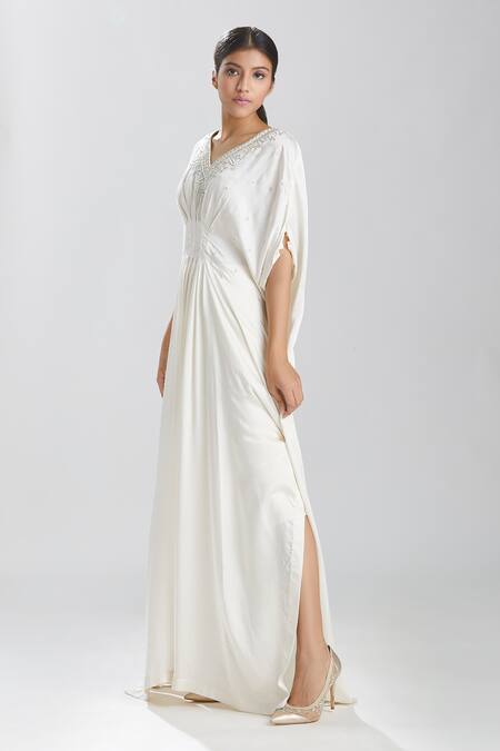Megha Bansal Ivory Satin Cut Dana, Sequin And Beads Work V Neck Motia Azmina Kaftan Gown at Aza Fashions Megha Bansal_Ivory Satin Cut Dana, Sequin And Beads Work V Neck Motia Azmina Kaftan Gown _at_Aza_Fashions