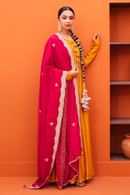 Kesar Studio_Yellow Silk Tassels Round Neck Gown With Embroidered Dupatta_Online_at_Aza_Fashions