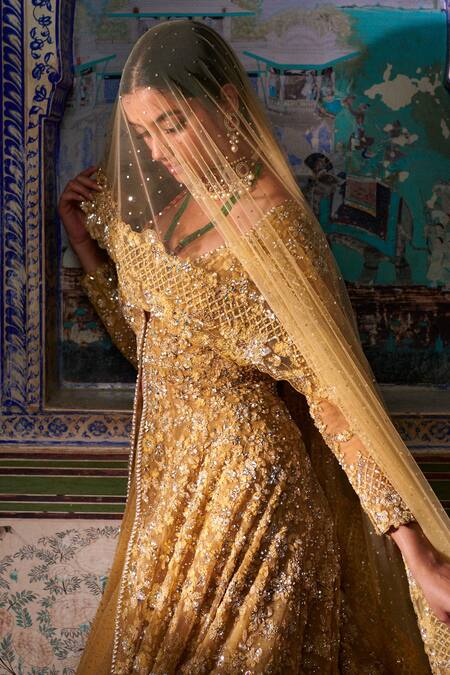 Shop_Seema Gujral_Gold Net Floral Plunge V Neck Embroidered Jacket Lehenga Set _Online_at_Aza_Fashions