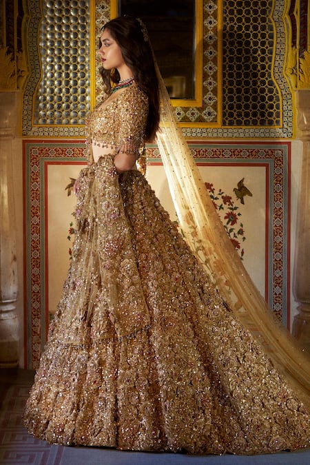 Seema Gujral_Gold Net Floral Sweetheart Neck Metallic Embroidered Bridal Lehenga Set _Online_at_Aza_Fashions