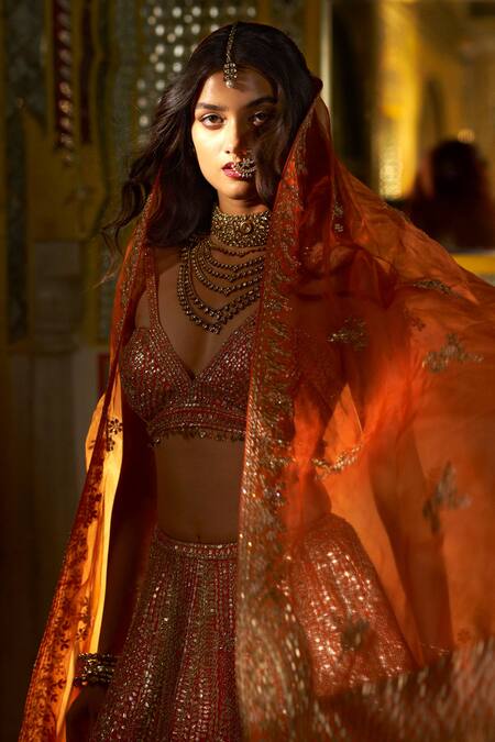 Seema Gujral Orange Raw Silk Gota Patti Sweetheart Neck Work Bridal Lehenga Set at Aza Fashions Seema Gujral_Orange Raw Silk Gota Patti Sweetheart Neck Work Bridal Lehenga Set _at_Aza_Fashions
