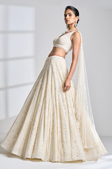 Seema Gujral Ivory Net Pearl, Sequin And Beads One Shoulder Blouse & Lehenga Set Online at Aza Fashions Seema Gujral_Ivory Net Pearl, Sequin And Beads One Shoulder Blouse & Lehenga Set _Online_at_Aza_Fashions