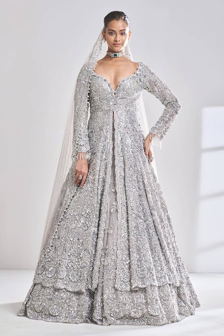 Shop Seema Gujral Silver Net Zardozi Sweetheart Neck Embroidered Jacket Lehenga Set Online at Aza Fashions Shop_Seema Gujral_Silver Net Zardozi Sweetheart Neck Embroidered Jacket Lehenga Set _Online_at_Aza_Fashions