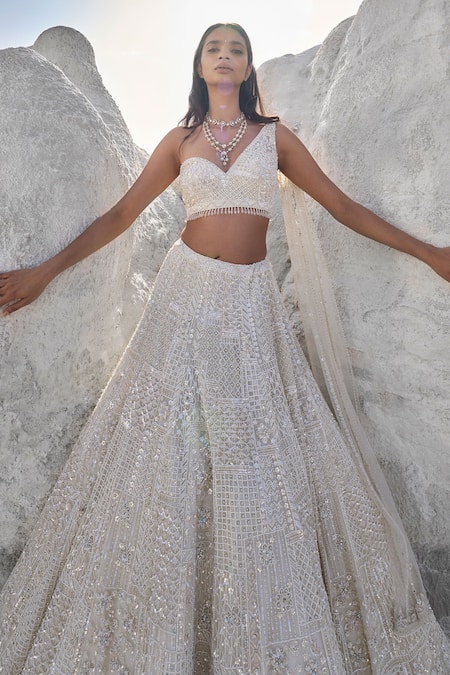 Buy Seema Gujral Ivory Net Pearls, Sequins, Beads One Shoulder Embroidered Lehenga And Blouse Set Online at Aza Fashions Buy_Seema Gujral_Ivory Net Pearls, Sequins, Beads One Shoulder Embroidered Lehenga And Blouse Set _Online_at_Aza_Fashions
