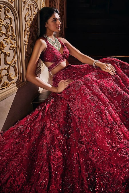 Seema Gujral_Maroon Net Crystal, Sequin, Beads Plunge V Neck Embroidered Bridal Lehenga Set _at_Aza_Fashions