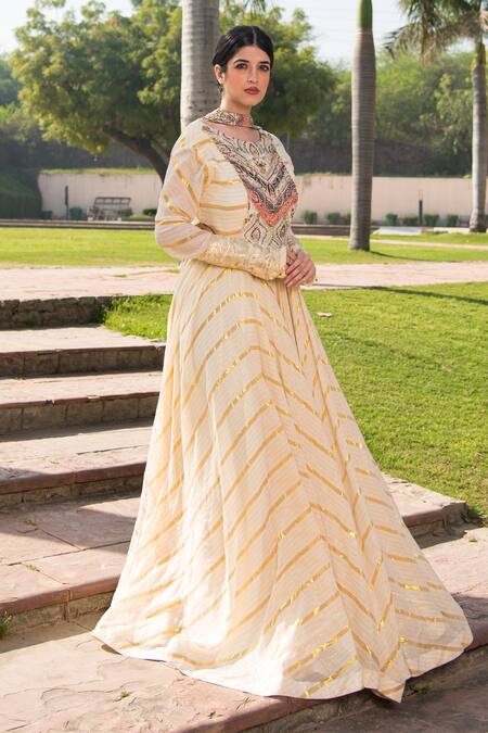 Soniya G Ivory Handloom Cotton Tassels Round Neck Embroidered Yoke Anarkali With Dupatta at Aza Fashions Soniya G_Ivory Handloom Cotton Tassels Round Neck Embroidered Yoke Anarkali With Dupatta _at_Aza_Fashions