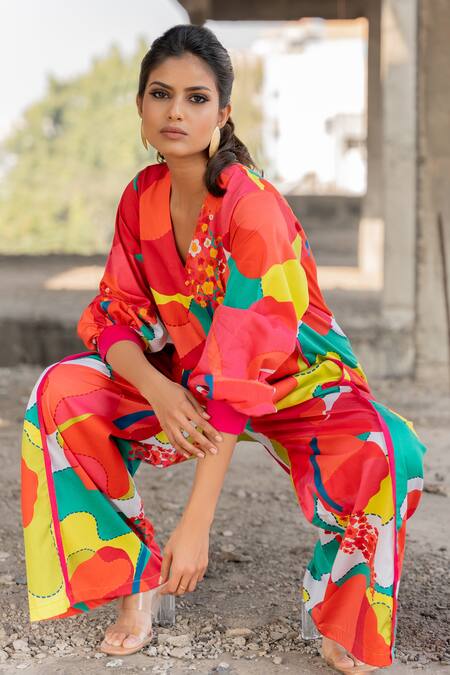 Shop_Pooja-Keyur_Multi Color Cotton Satin V-neck Abstract Splash Print Jumpsuit_Online_at_Aza_Fashions
