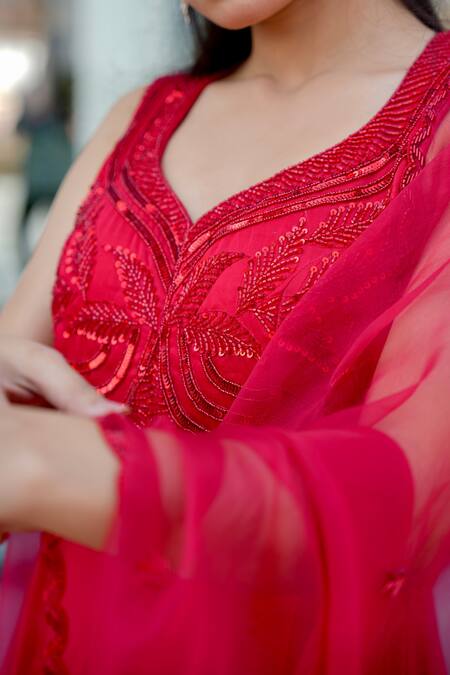 Gul By Aishwarya Red Satin Silk Hand Embroidered Cutdana Leaf Neck Anarkali Palazzo Set at Aza Fashions Gul By Aishwarya_Red Satin Silk Hand Embroidered Cutdana Leaf Neck Anarkali Palazzo Set _at_Aza_Fashions