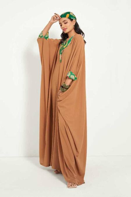 Shop Style Junkiie Beige Crepe Embroidery Halter Neck Flared Jumpsuit Online at Aza Fashions Shop_Style Junkiie_Beige Crepe Embroidery Halter Neck Flared Jumpsuit _Online_at_Aza_Fashions