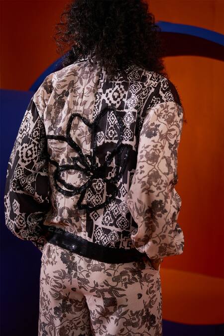 The Dramebaaz CO Black Muslin Sequins Collared, V-neck Abstract Print Jacket And Pant Set Online at Aza Fashions The Dramebaaz CO_Black Muslin Sequins Collared, V-neck Abstract Print Jacket And Pant Set _Online_at_Aza_Fashions