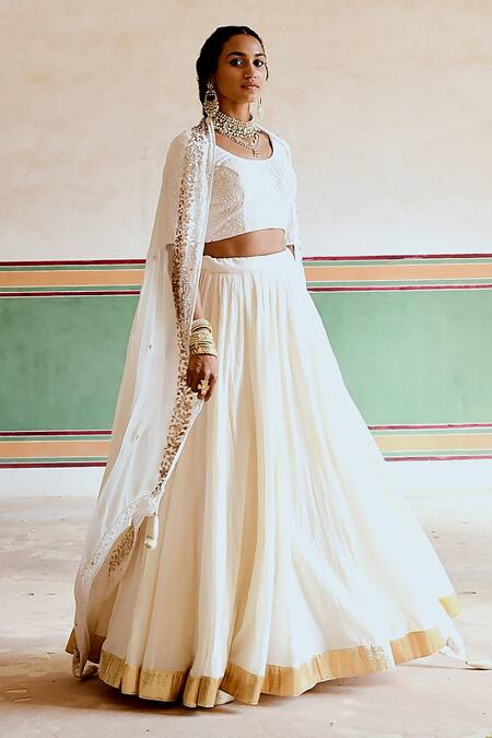 Shop_Karaj Jaipur_Cream Georgette, Cotton, Crepe Embroidery, Tassels Round Neck Blouse Lehenga Set _Online_at_Aza_Fashions