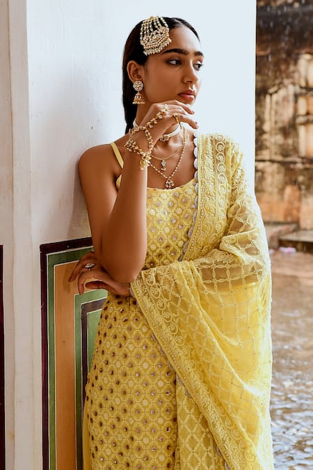 Shop Karaj Jaipur Yellow Georgette Sequins, Embroidery, Tassels Round Chikankari Kurta Skirt Set Online at Aza Fashions Shop_Karaj Jaipur_Yellow Georgette Sequins, Embroidery, Tassels Round Chikankari Kurta Skirt Set _Online_at_Aza_Fashions
