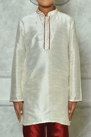 Buy Petite Pomme Cream Silk Embroidery Dupion Art Kurta Online at Aza Fashions Buy_Petite Pomme_Cream Silk Embroidery Dupion Art Kurta _Online_at_Aza_Fashions