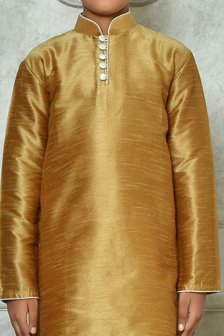 Petite Pomme Brown Silk, Cotton Solid Kurta And Contrast Churidar Set at Aza Fashions Petite Pomme_Brown Silk, Cotton Solid Kurta And Contrast Churidar Set _at_Aza_Fashions