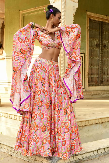 Pinkish Peach Lucknowi Lehenga And Crop Top With Bell Sleeves And Elaborate  Collar Online - Kalki Fashion | Crop tops, Lehenga crop top, Two piece dress