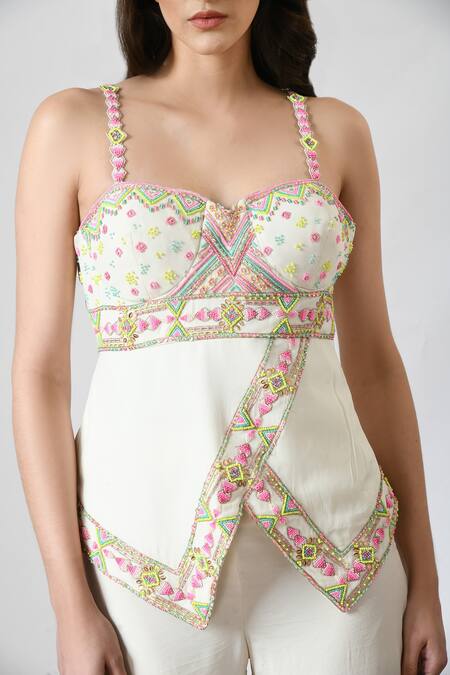Salt And Spring_Ivory Crepe Beads Sweetheart Neck Embellished Bustier And Flared Pant Set _at_Aza_Fashions